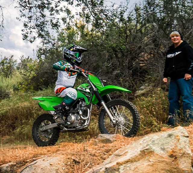 Image of 2024 KLX140R in action