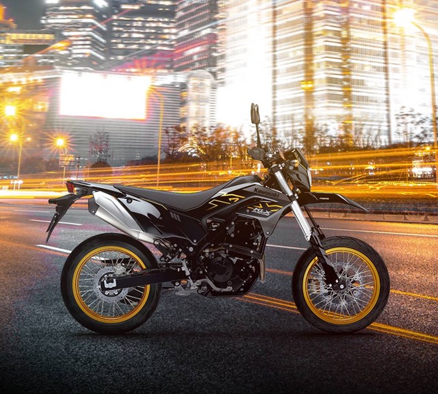 Image of 2023 KLX230SM in action